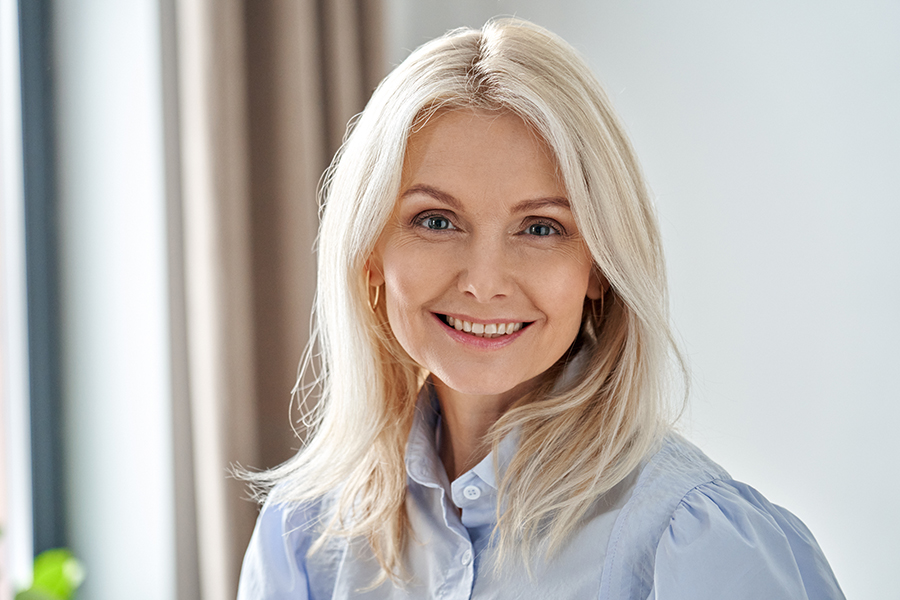 Smiling mature woman confident after cataract surgery